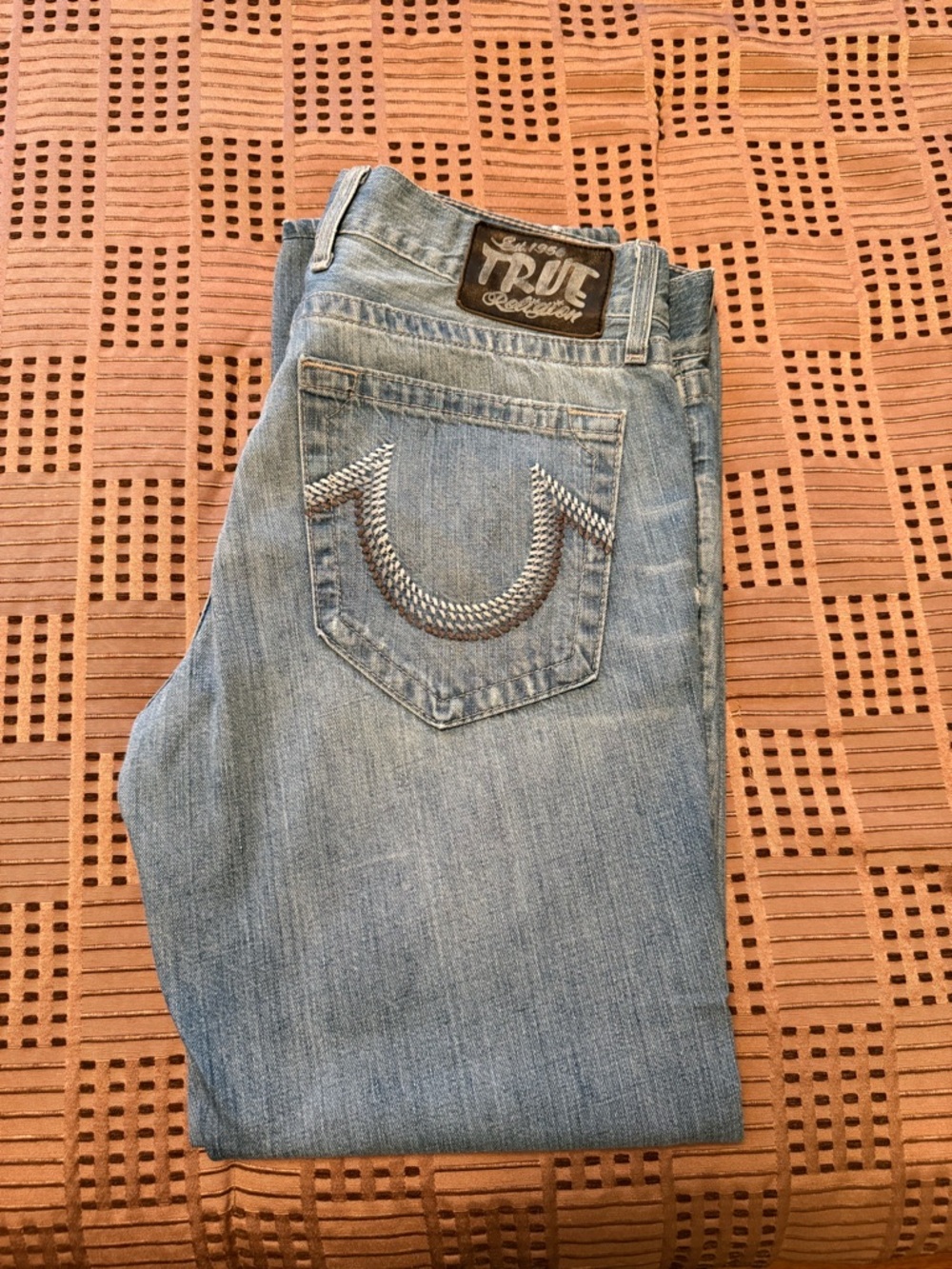 True Religion Faded Light Blue Denim Jeans with Horseshoe Back Stitching